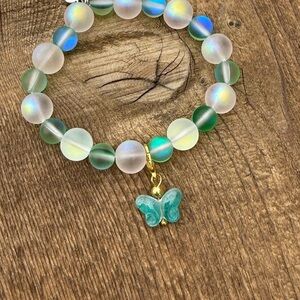 Elegant Green and White Beaded Bracelet with Butterfly Charm